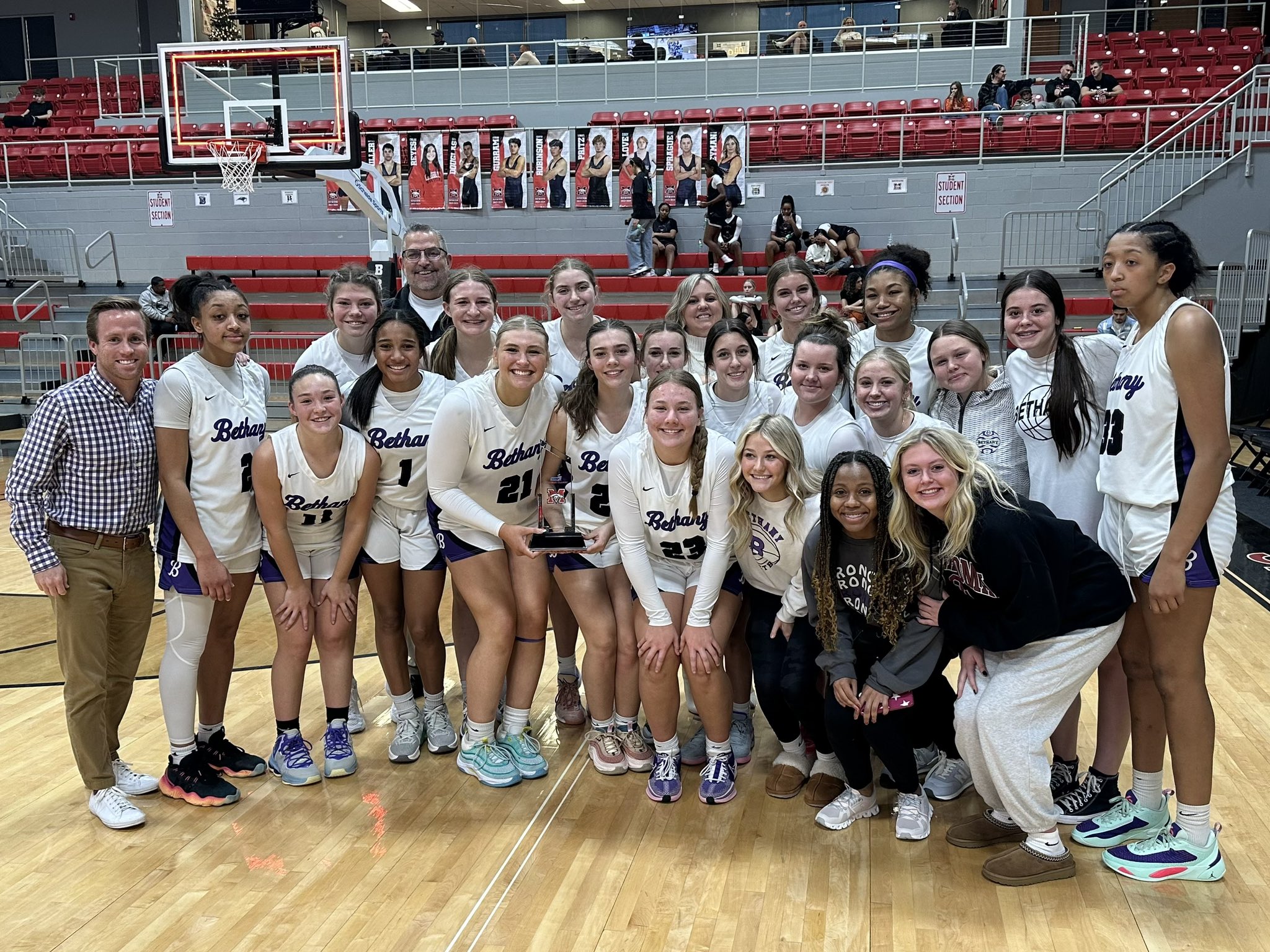 Bethany Lady Bronchos pose with the third-place trophy at the Bank 7 Mustang Holiday Classic Saturday (Dec. 30).