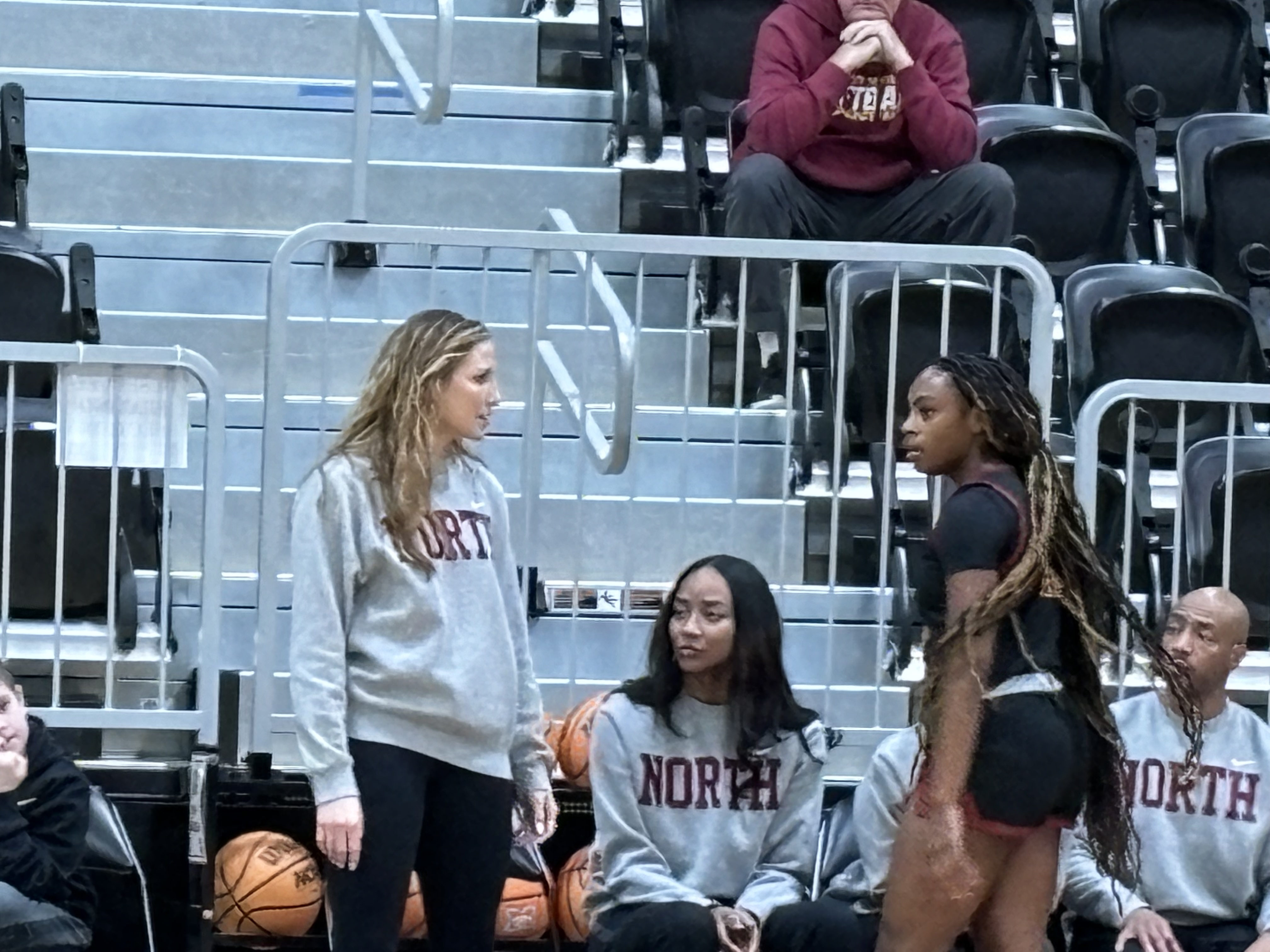Putnam City North Lady Panthers' head coach Logan Martin talks to one of her players during North's loss to Bethany Thursday (Dec. 28) in the Bank 7 Mustang Holiday Classic.
