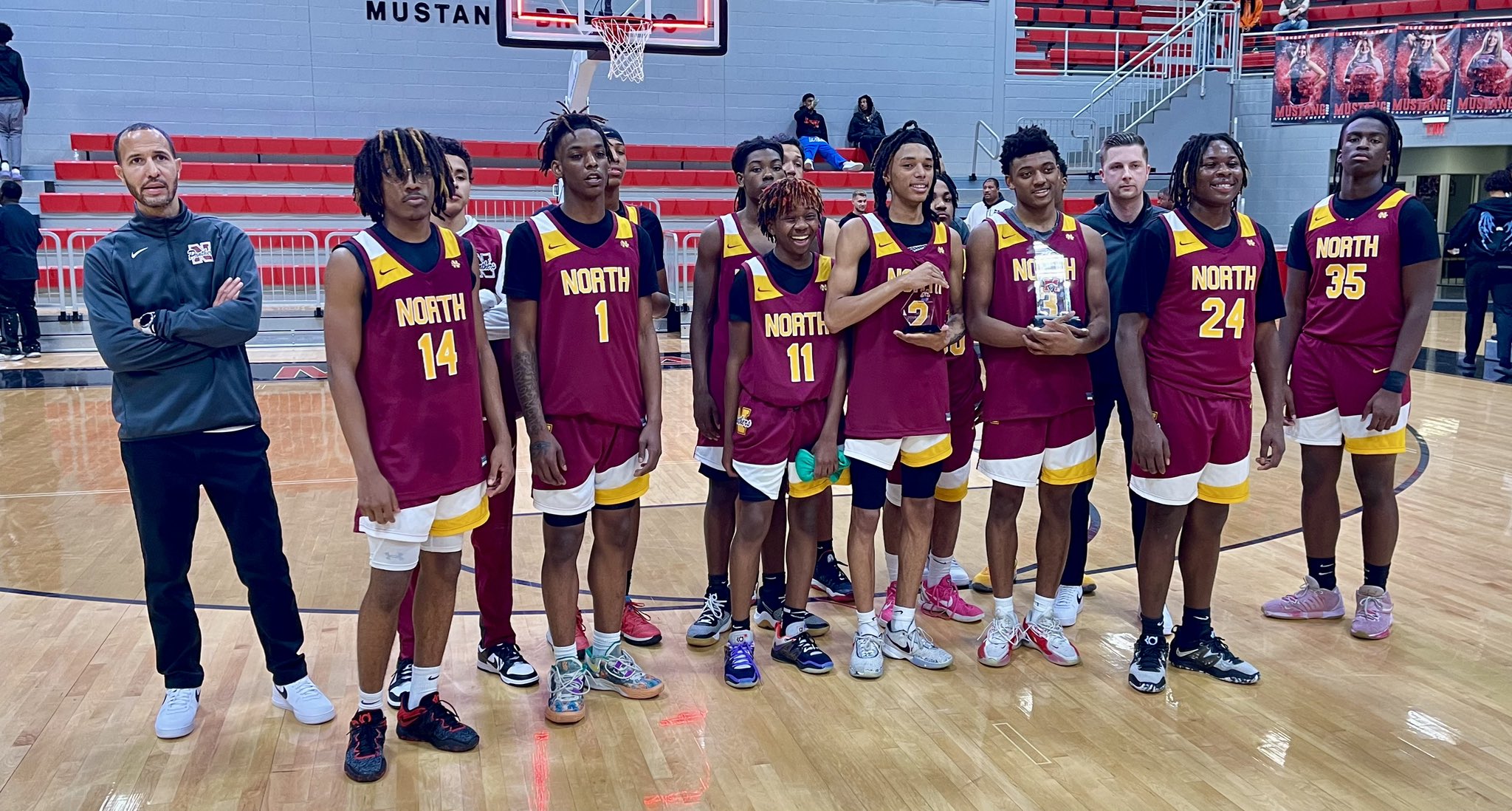 Putnam City North poses with the runner up trophy after the title game in the Bank 7 Mustang Holiday Classic.
