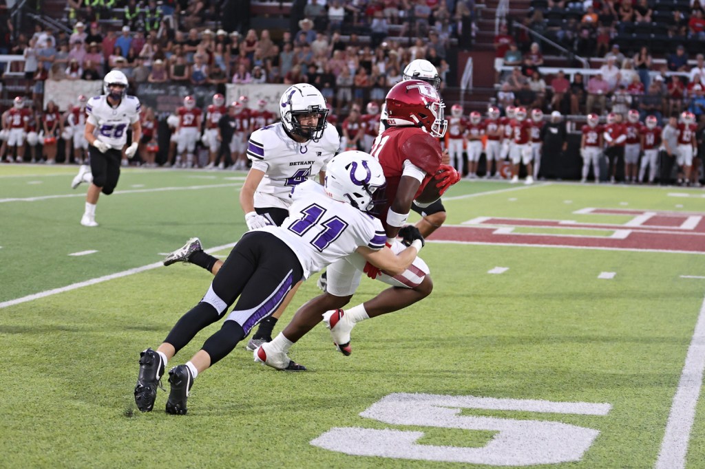 Top-ranked Tuttle speeds past Bethany,&nbsp;69-0